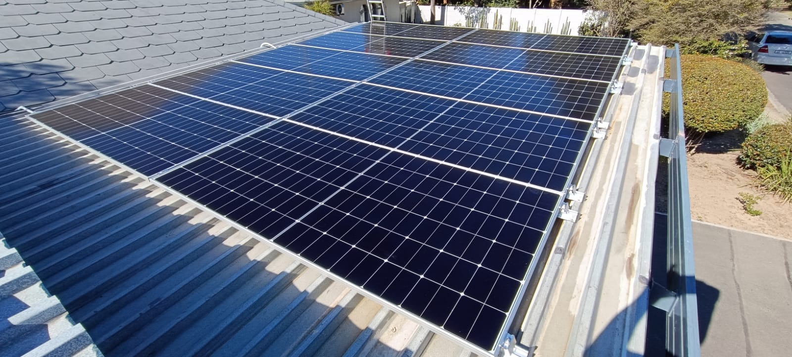 Solar panel array installed on a tiled roof