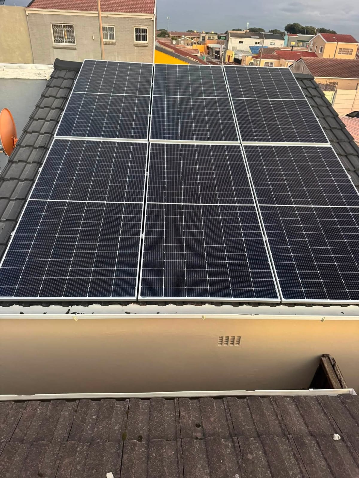 Solar panels installed on a tiled residential roof